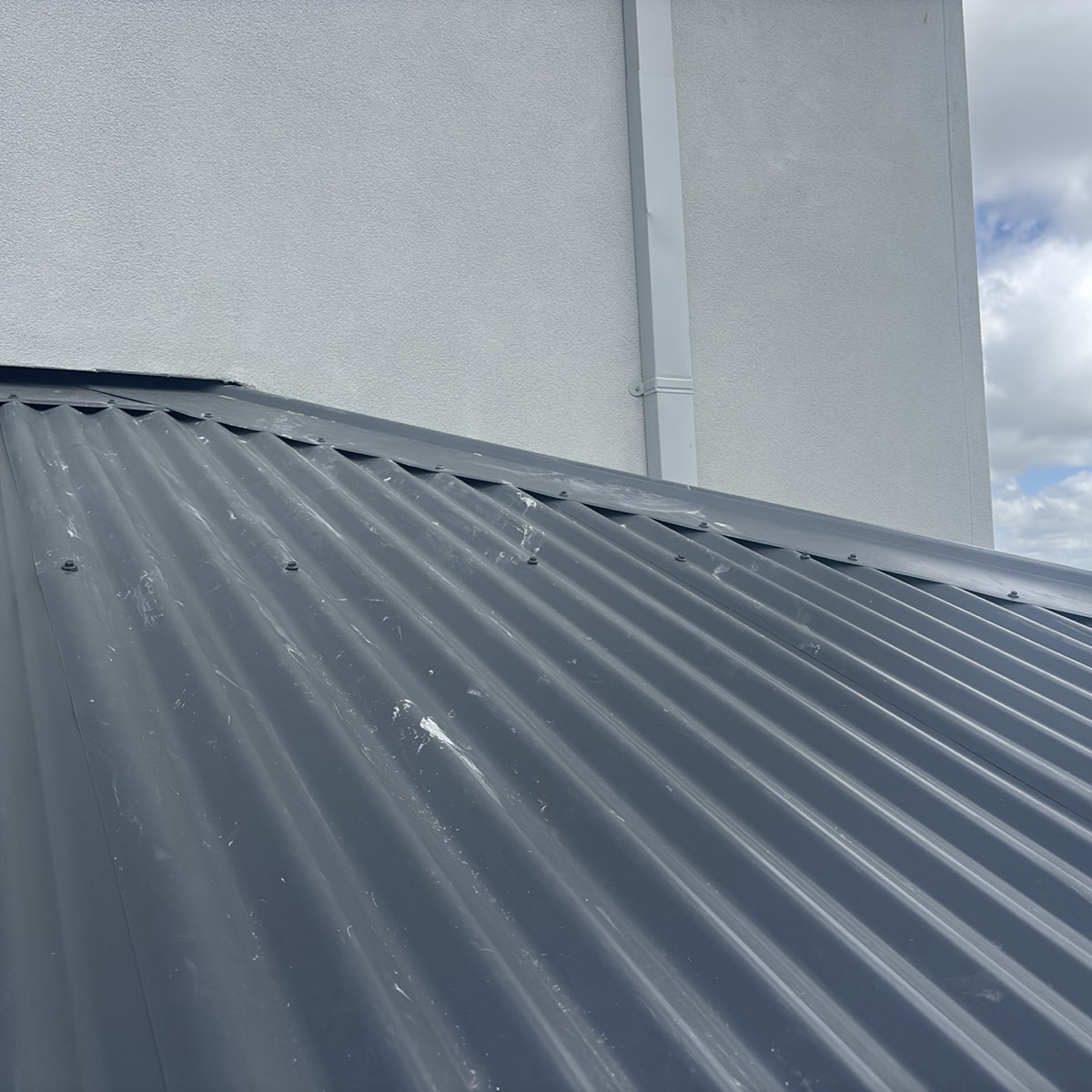 Damaged roof cladding recorded during a pre-handover inspection in Craigieburn