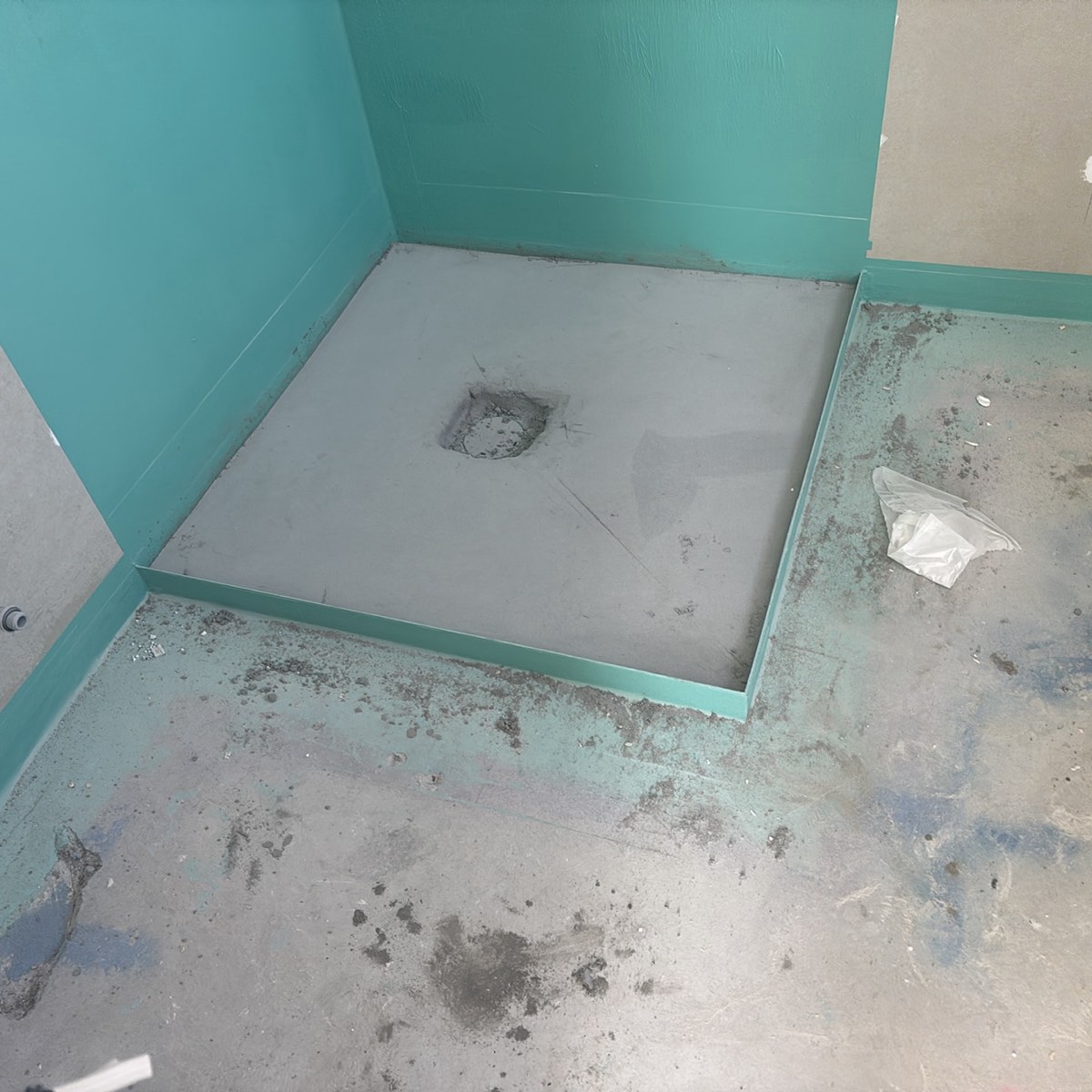 Incomplete waterproofing to an ensuite, recorded during a fixing stage inspection in Craigieburn